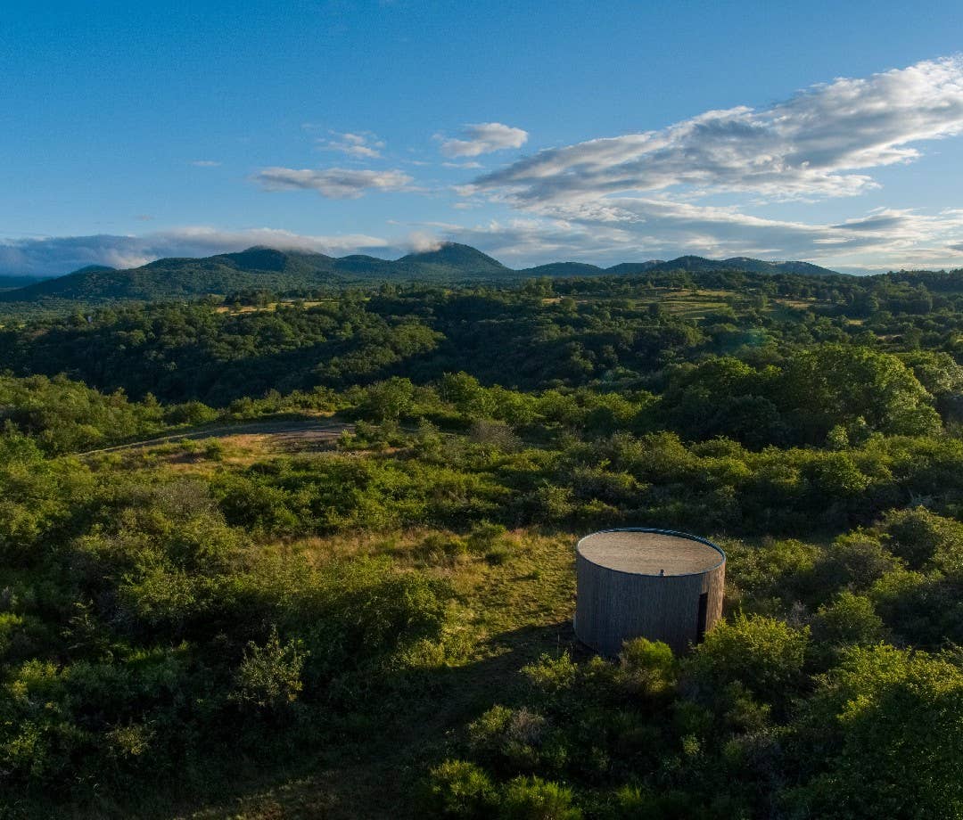 This unique LUMIPOD rental from Airbnb and Volvic overlooks the Chaîne des Puys volcano cluster in France.